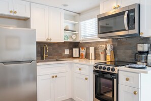 New kitchen with stainless appliances