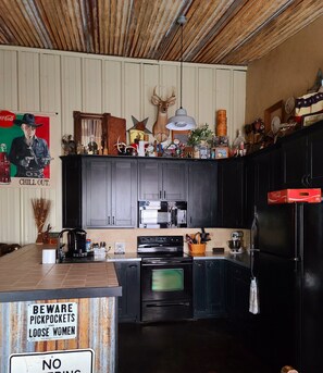 Fully outfitted kitchen with all appliances you could need to cook during stay.