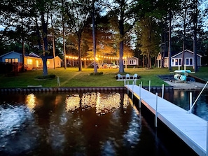 View of the resort at night from the dock