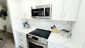 Clean and Fully Equipped Kitchen