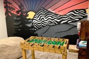 Kids and adults love hanging out down here together. It's also a quiet nook that sometimes is perfect for reading a good book on the bean bag chair.