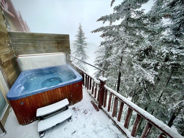 Private hot tub overlooking Upper Flume. Watch skiers go by from elevated deck