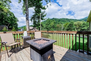 Breathe in the mountain air and cozy up around this fire pit.