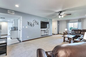 View of kitchen from the living area and front entrance