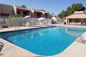 Side view of the pool with plenty of places to sit.