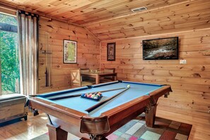 Big windows let in lots of light while you shoot pool.