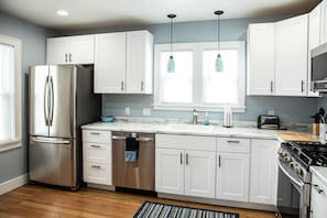Fully equipped NEW kitchen with everything you need to prepare meals. 