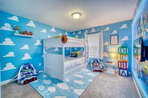 Bullseye's bedroom has a Bunk bed with an additional twin trundle pull out.