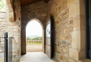 Stonework walls, complete with arches and tower