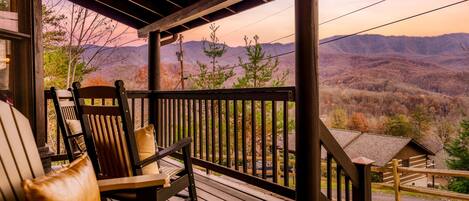Sink into relaxation on 'Bear Bottom' cabin's front porch.                      