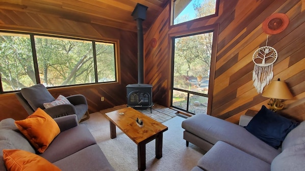 The living room is a great place to relax, read a book, and watch nature.