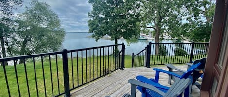 Large wrap around deck with cosy Adirondack chairs to enjoy the bay views from.