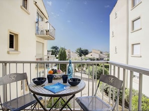 Building, Sky, Table, Window, Plant, Chair, Fence, Outdoor Furniture, Outdoor Table, Urban Design