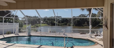 Take a dip in the large relaxing pool with a view of the lake and wildlife!