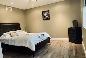 Master bedroom with queen bed - main level