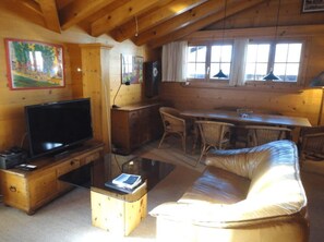 the charming wooden living room 