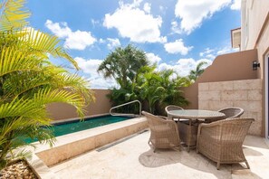 Private patio with seating area