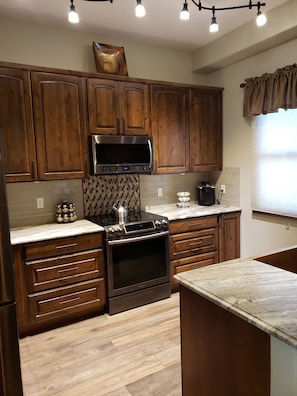 Kitchen, knotty alder cabinets and drawers. 