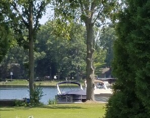 Waterfront is between the 2 trees shared dock by tree to (west) right!