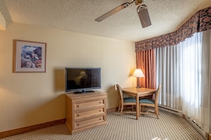 Chair, Furniture, Screen, Flooring, Living Room