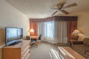 Screen, Flooring, Chair, Furniture, Ceiling Fan