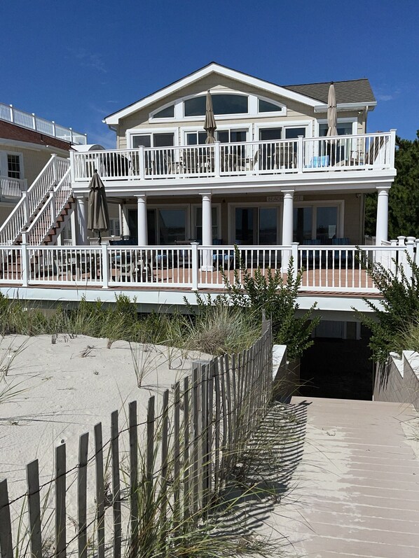 Beach view of the house from your private beach access board walk.