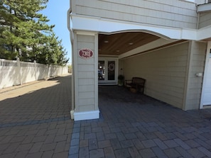 Front entrance off paver court yard