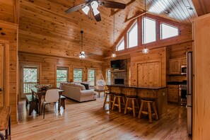 Vaulted cabin ceilings with stain glass window