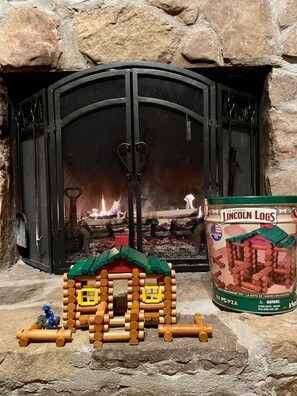 Don't forget to cozy up near the fireplace and build your very own cabin
