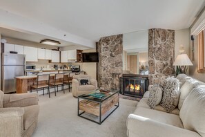 Living room with wood-burning fireplace