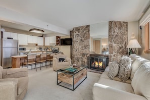 Living room with wood-burning fireplace