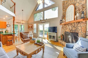 Living Room | Stone Gas Fireplace | Smart TVs