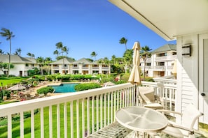 Lush manicured lawn, Hawaiian landscape, and refreshing pool