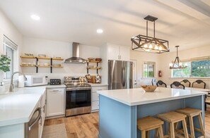 Remodeled Kitchen  new stainless steel fridge, oven, stove, dishwasher, quartz. 