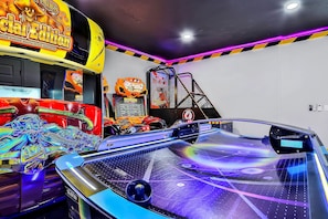 Countless hours of fun await in the exciting arcade room