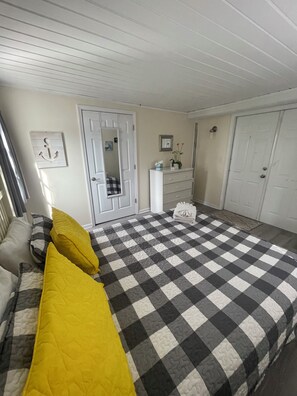 Queen 2nd bedroom, double doors exterior entrance, singlle door leads to 1st  BR