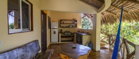 Private fully equipped kitchen with hammock 