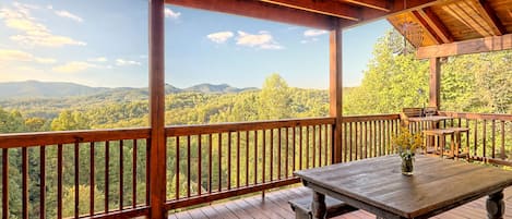 View from the main level deck; outdoor dining table. 