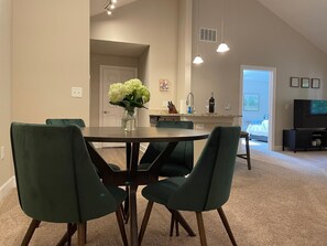 Beautiful dining table with cozy seating in the main living area.