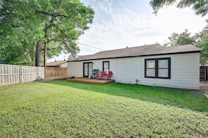 Private and fenced backyard with Weber BBQ.