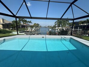 Pool area with picture window lanai screen
