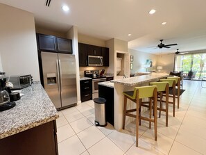 The updated kitchen has stainless steel appliances, including a dishwasher, plus in-suite laundry.
