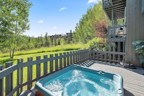 Enjoy a relaxing soak in your spacious private hot tub on the lower deck of this incredible townhome.