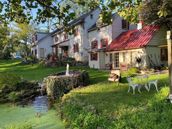 Jamelia cottage on the right with red roof.