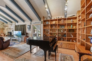 Grand piano in living room (please do not place drinks on it!)