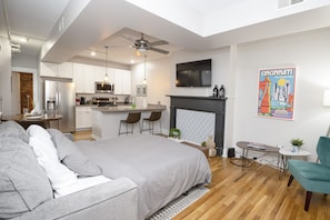 The sleeper sofa located in the living room becomes an extra queen sized bed.