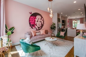 Discover this chic Nashville vacation rental, where stylish decor meets comfort! Ideal for family reunions or bachelorette parties, the vibrant space features a spacious living room perfect for unforgettable moments in Music City.