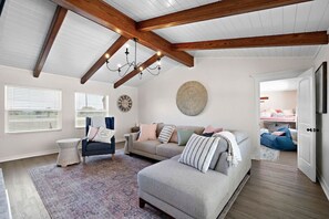 Curl up with a good book in the inviting living room