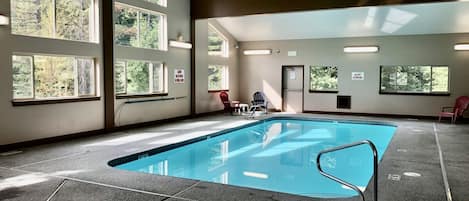 Rec center w Indoor heated pool & hot tub, game room with showers & bathrooms 
