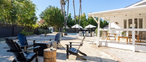 *Sunset happy hour at the fire pit is our favorite. Wine, cheese, bocce and pure relaxation as the sun sets over the Los Alamos hills.